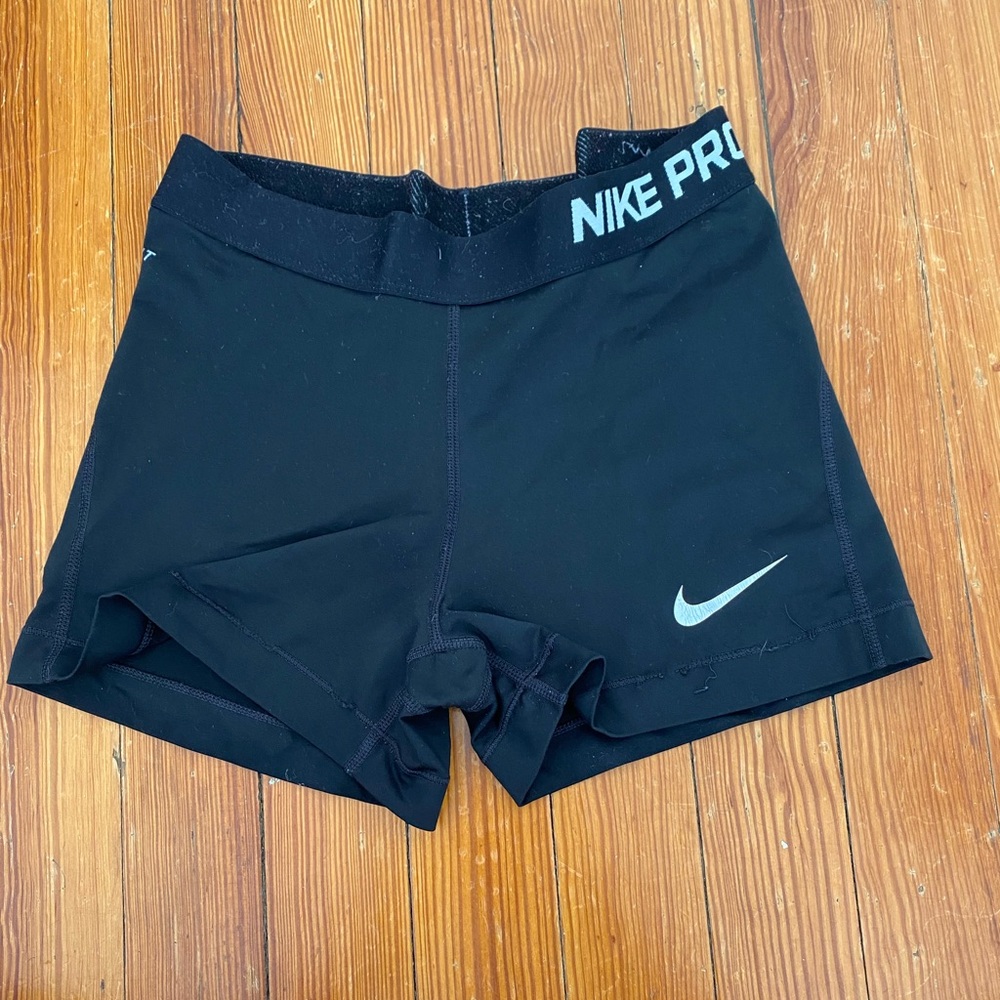 Plain Nike Pros. Worn once.